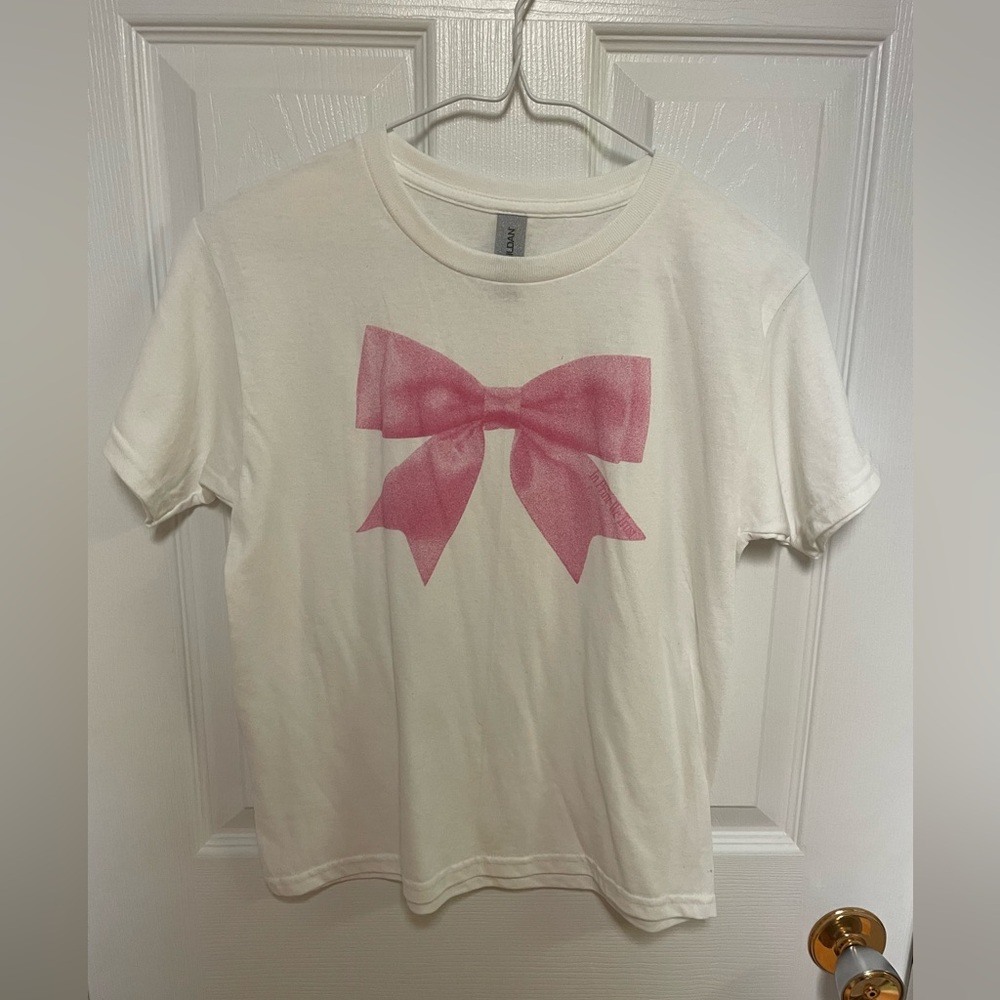 In Print We Trust pink bow baby tee